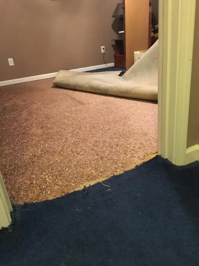 Carpet pad removal revealing water damage during Drying & Dehumidification in Boulder Creek