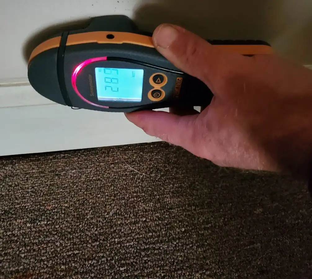 Moisture detection at baseboard during Storm Damage Restoration in Boulder Creek